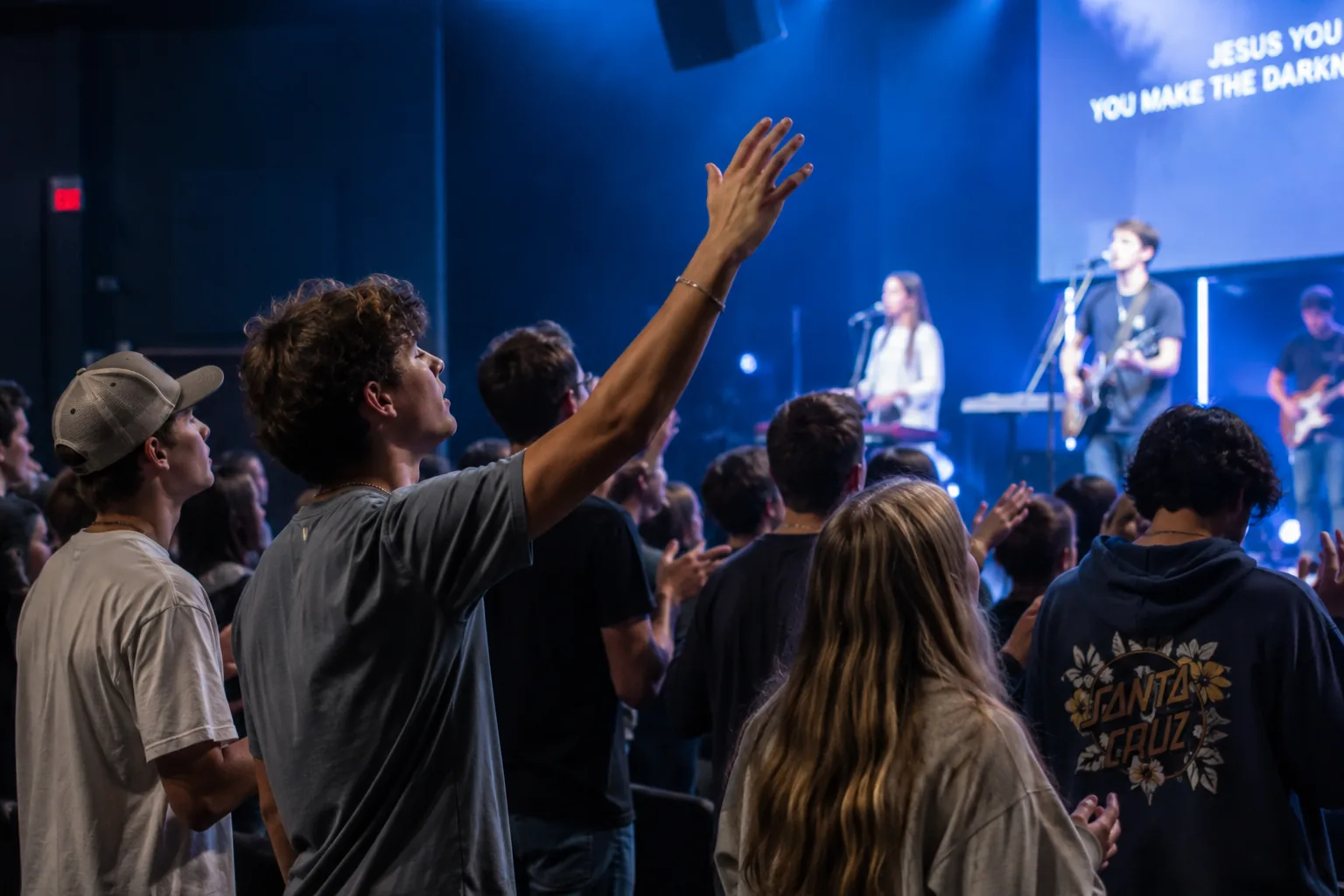 Students worshipping together at student ministry